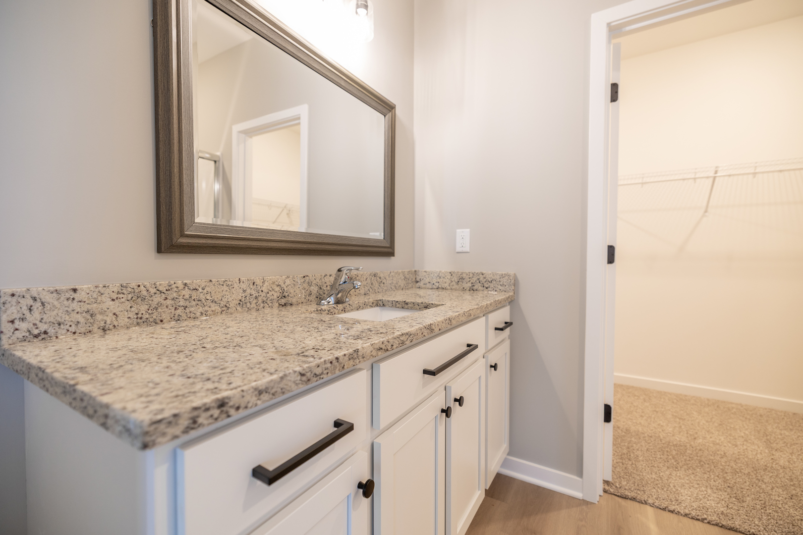 12 Redbud Row Ottawa, IL 61350 - Photo 18 of 39 a bathroom with a granite countertop sink and a mirror