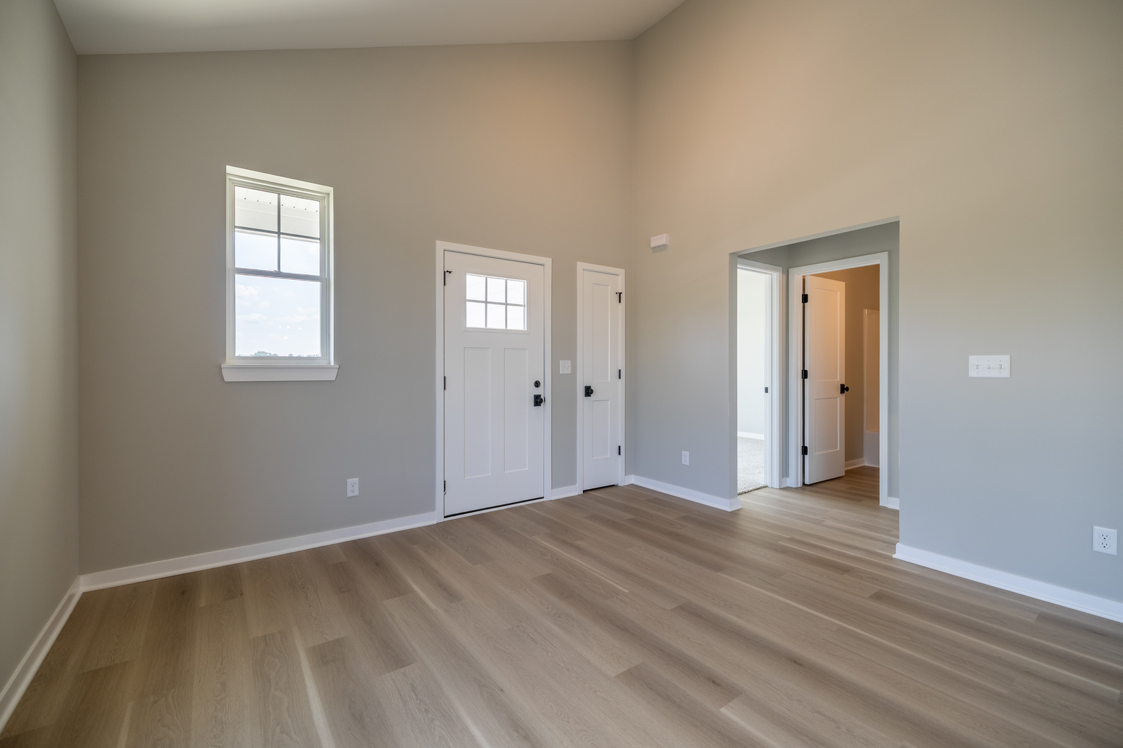 12 Redbud Row Ottawa, IL 61350 - Photo 25 of 39 a view of an empty room with wooden floor and a window