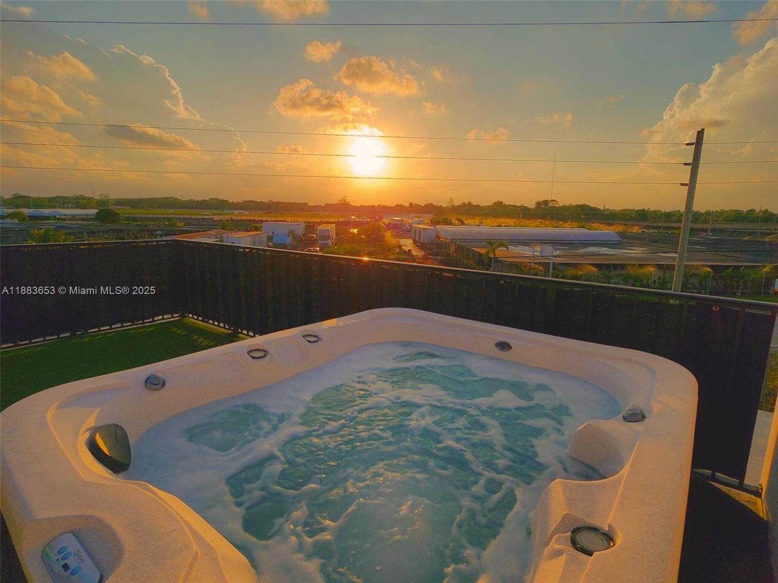 26144 Southwest 146th Court Homestead, FL 33032 - Photo 28 of 35 a view of a swimming pool with an ocean view