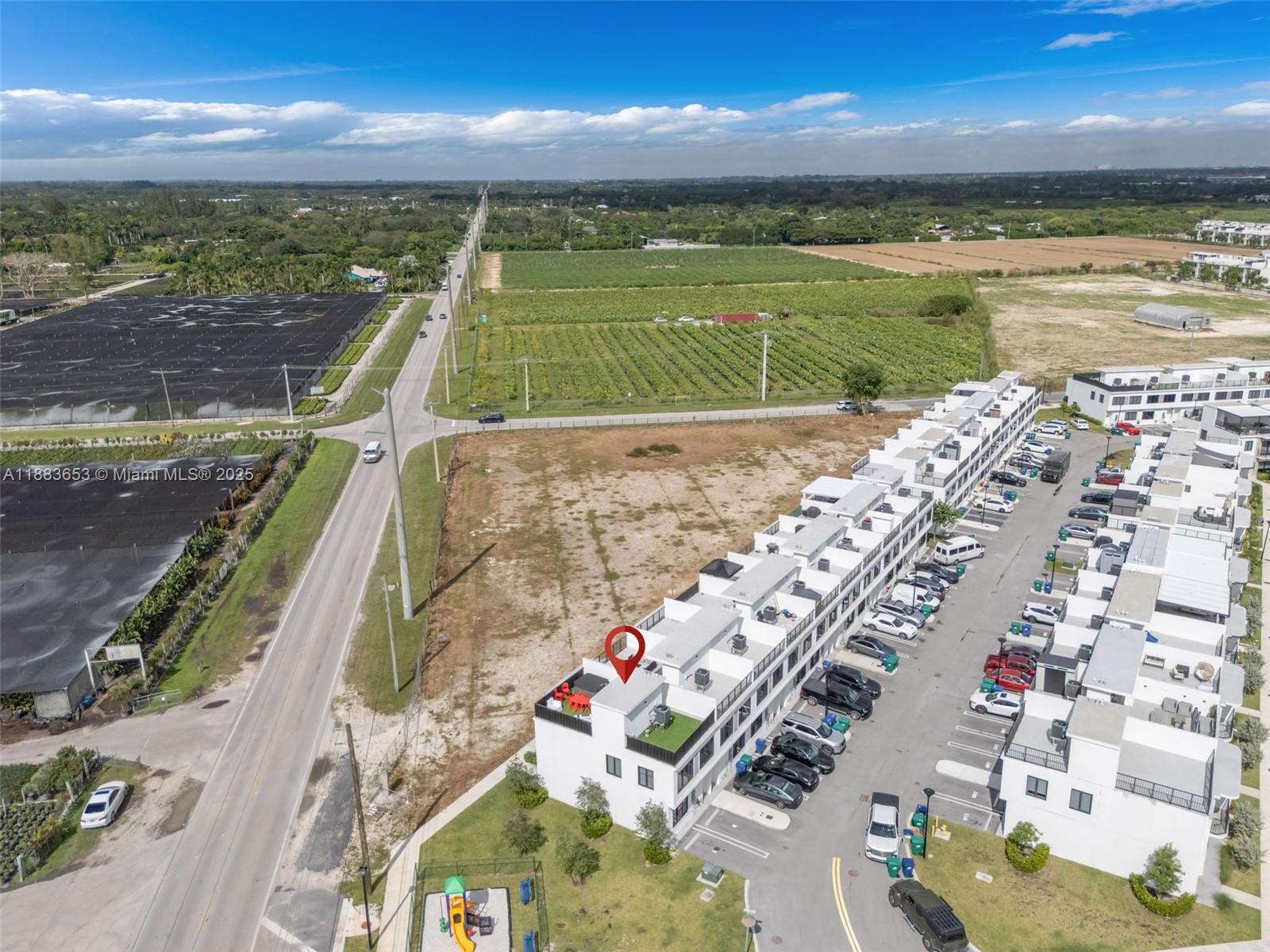 26144 Southwest 146th Court Homestead, FL 33032 - Photo 34 of 35 a view of a city with an ocean