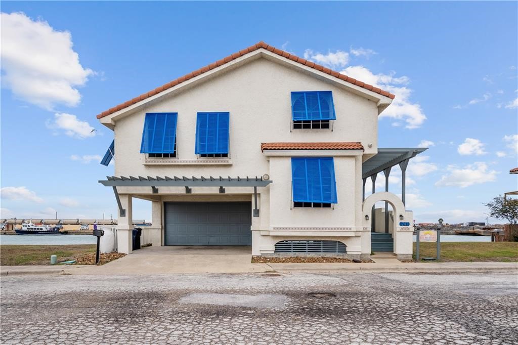 a view of a house with a ocean view