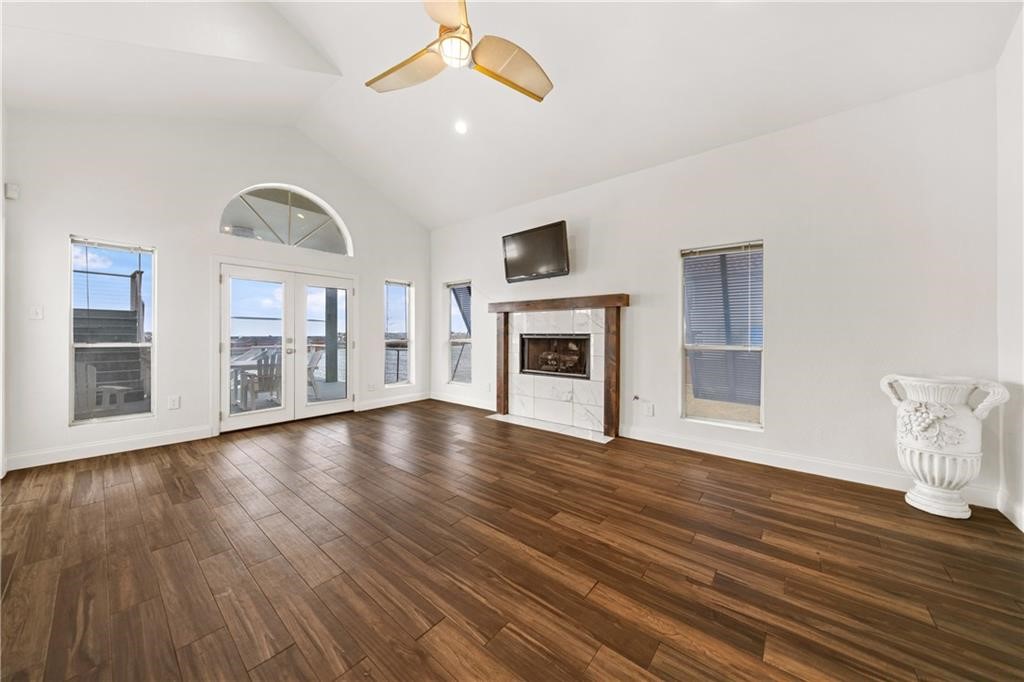 741 Snug Corpus Christi, TX 78402 - Photo 7 of 40 a view of empty room with wooden floor and fireplace
