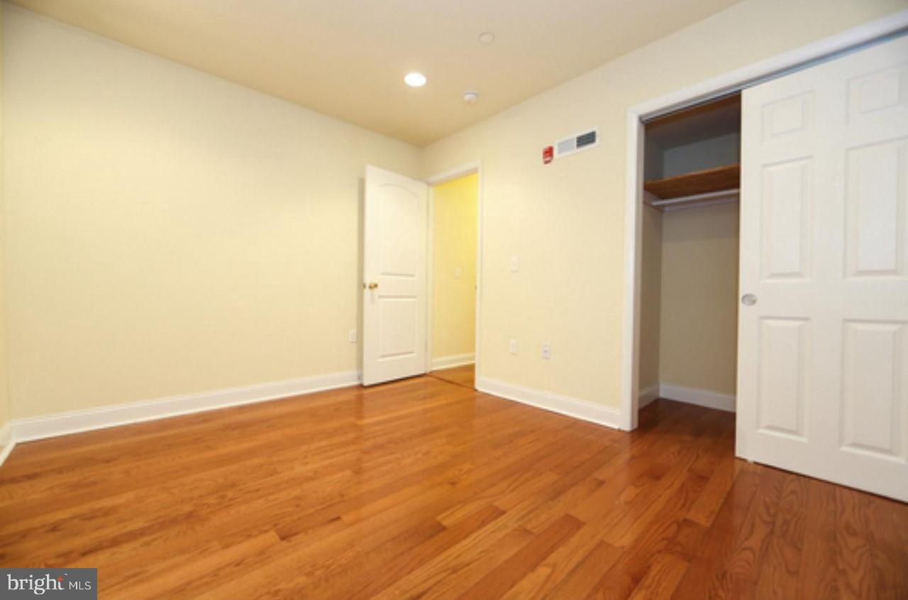 1708 West Diamond Street, Unit B Philadelphia, PA 19121 - Photo 11 of 20 a view of an empty room with wooden floor