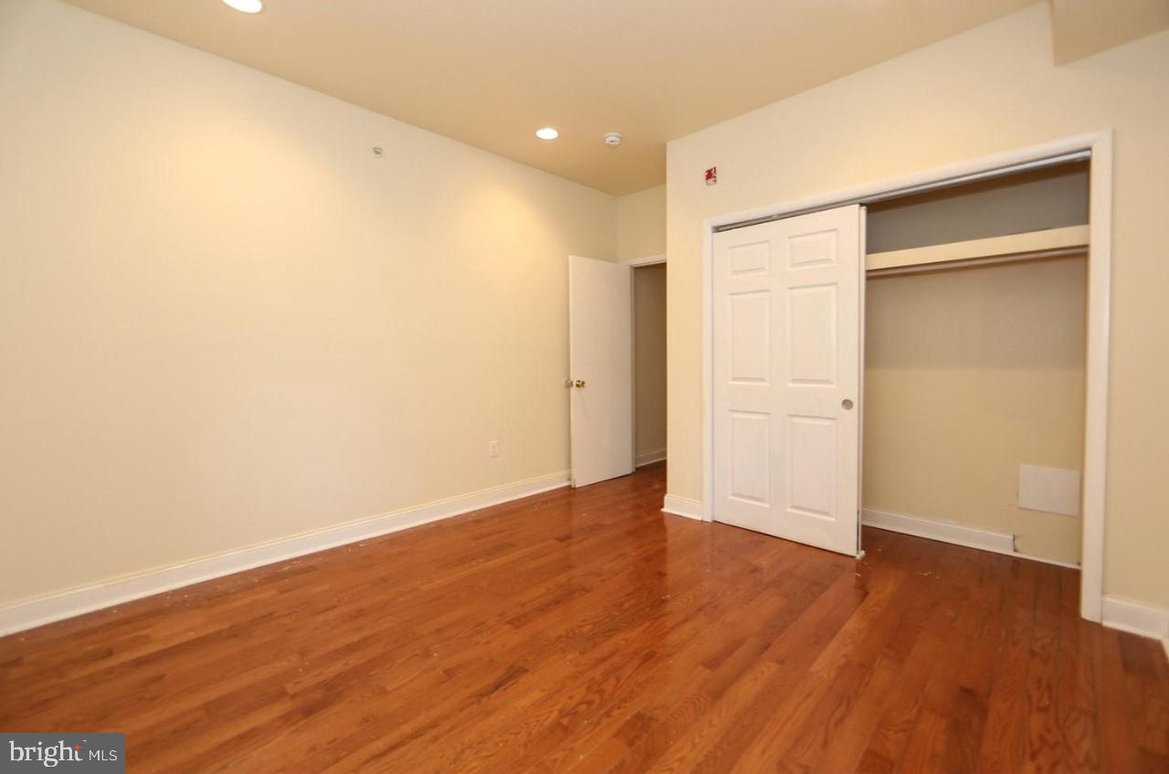 1708 West Diamond Street, Unit B Philadelphia, PA 19121 - Photo 14 of 20 a view of an empty room with wooden floor