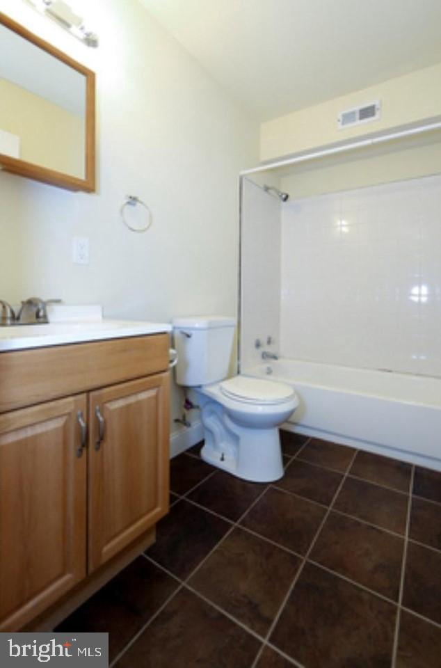1708 West Diamond Street, Unit B Philadelphia, PA 19121 - Photo 19 of 20 a bathroom with a sink toilet and shower