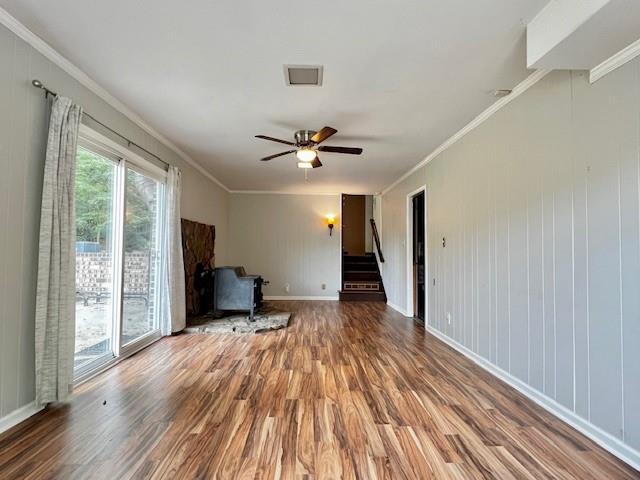 4541 Arcado Road Southwest Lilburn, GA 30047 - Photo 4 of 16 wooden floor in an empty room with a window