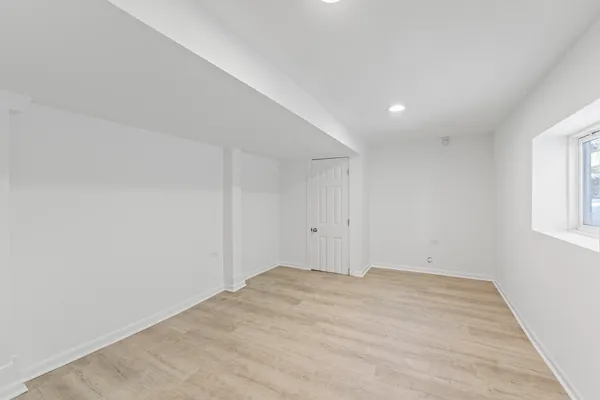 a bathroom with a toilet and shower