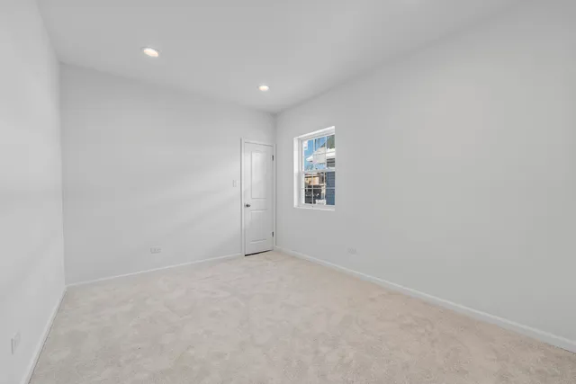 a kitchen with stainless steel appliances a stove top oven and cabinets
