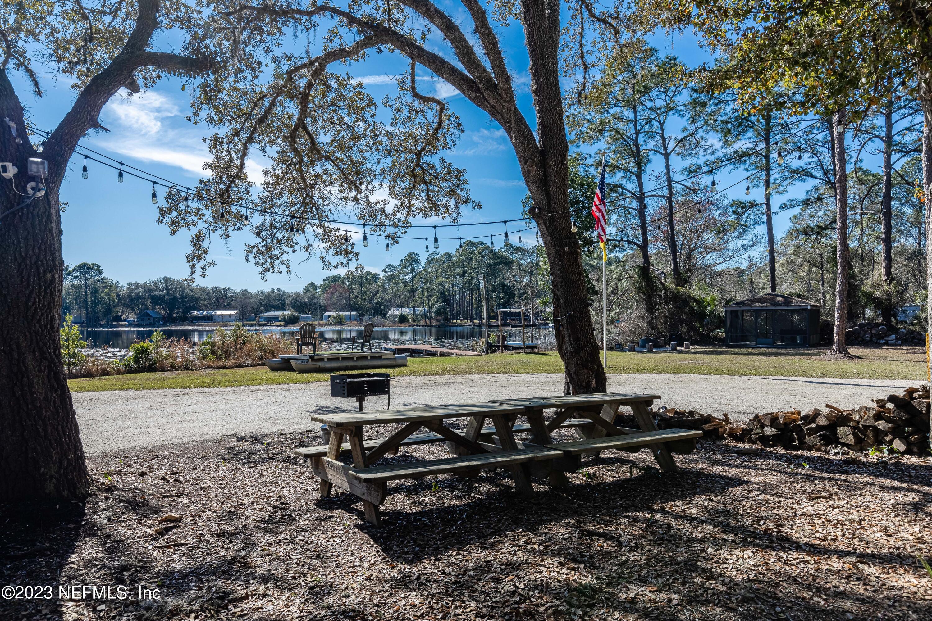 146 Sand Lake Road Interlachen, FL 32148 - Photo 8 of 78 Sitting Area Looking Over the Lake