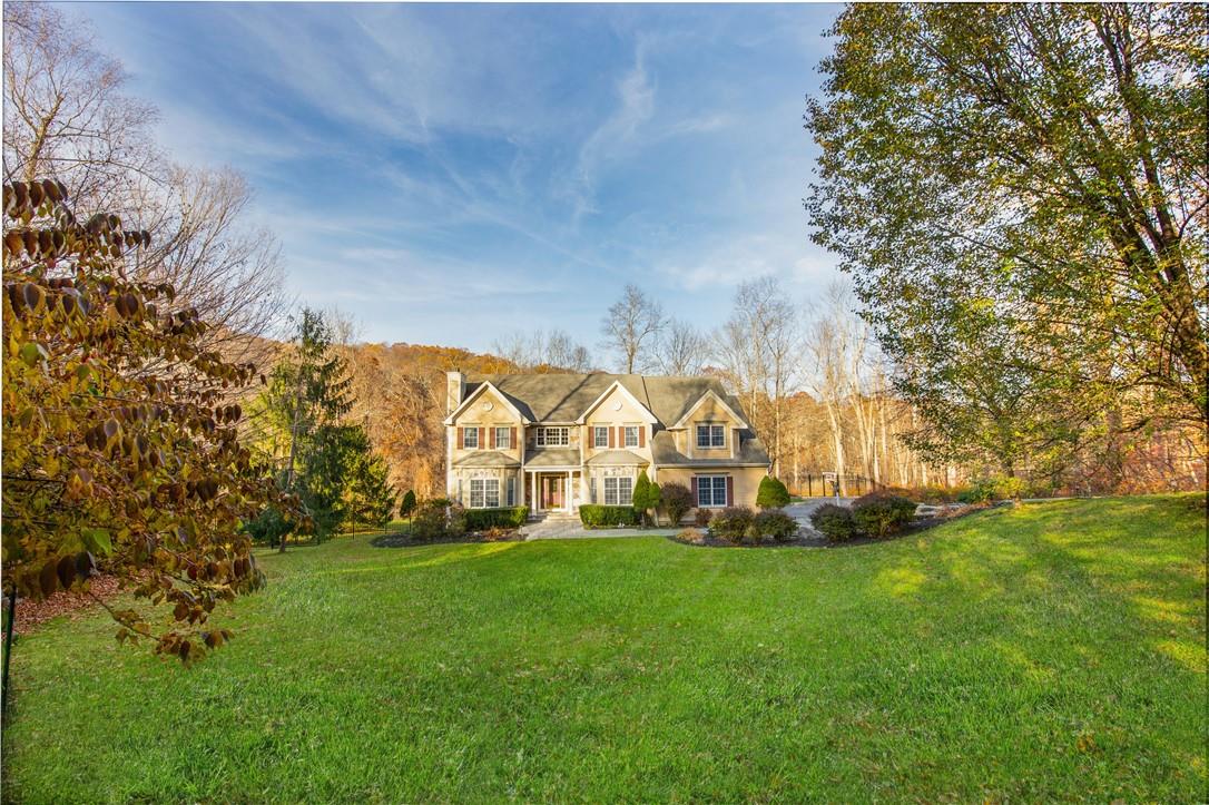 58 Lambert Ridge Road Cross River, NY 10518 - Photo 1 of 1 a view of white house with a big yard and large trees