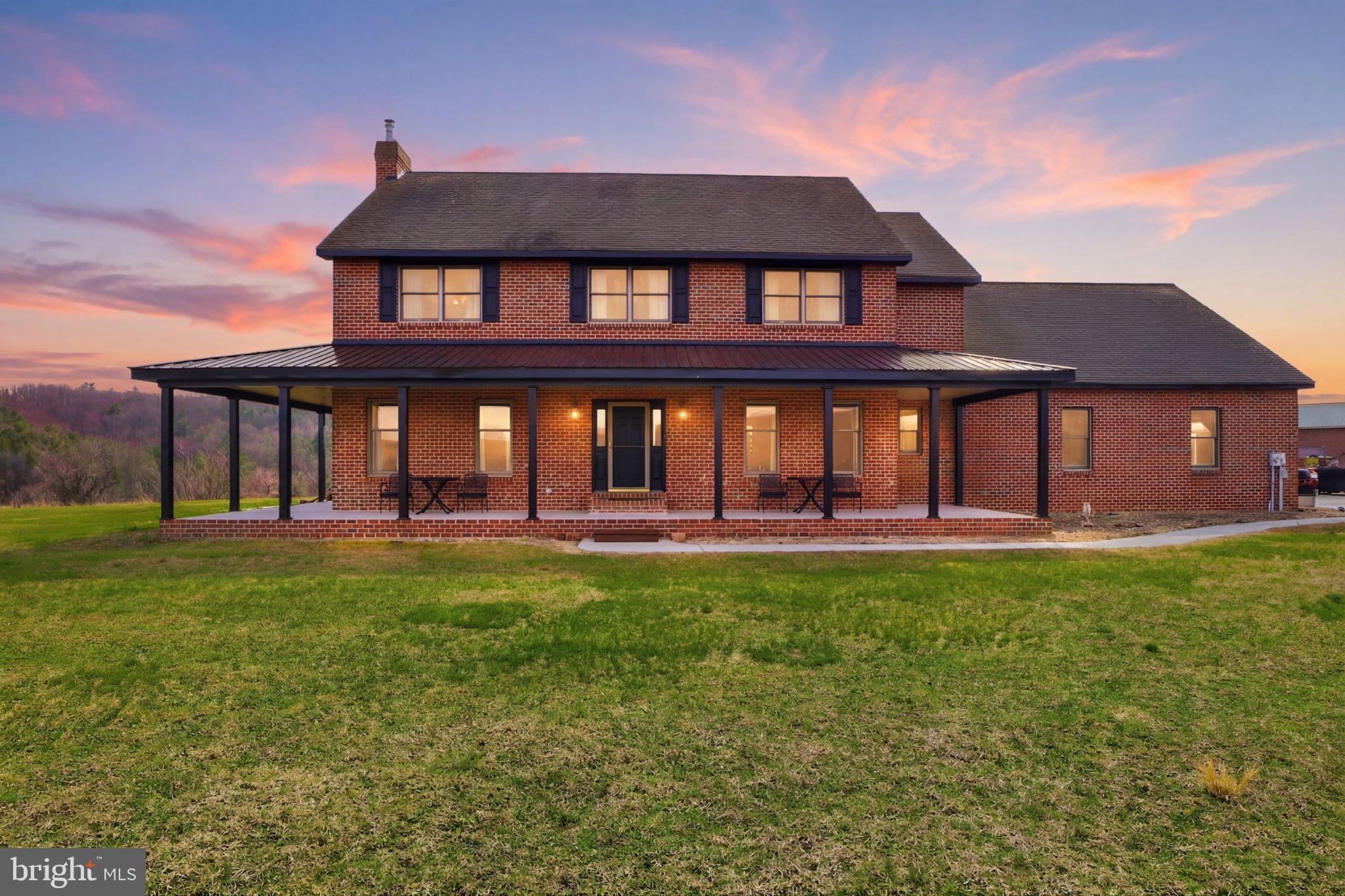 Charming brick home at sunset glow.