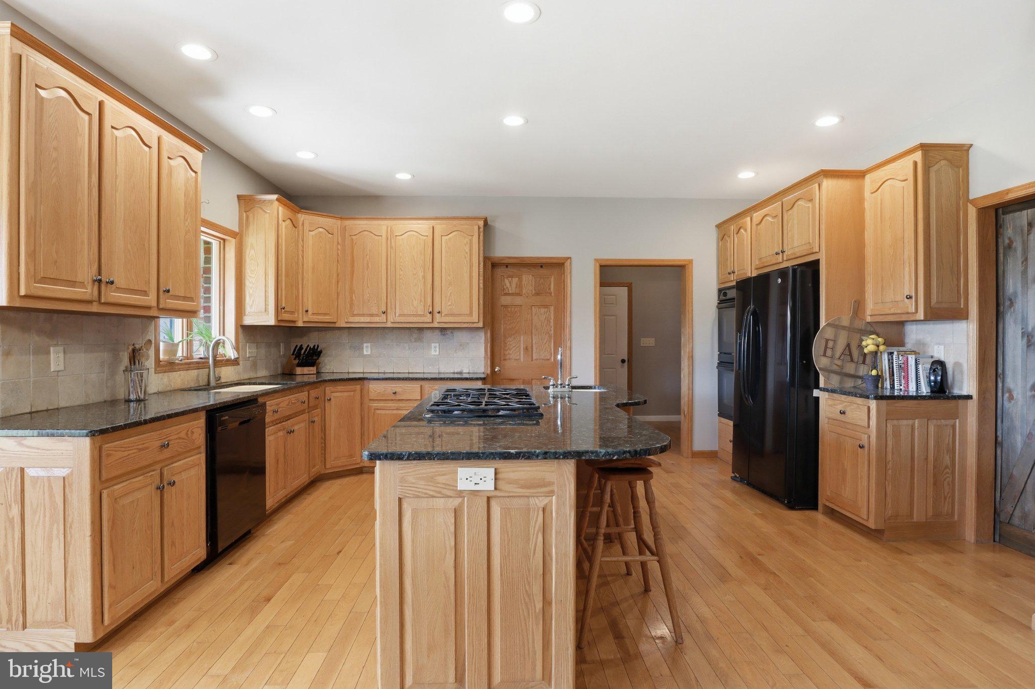 57 Mahanoy Valley Road Duncannon, PA 17020 - Photo 13 of 70 Spacious kitchen with warm wood tones.