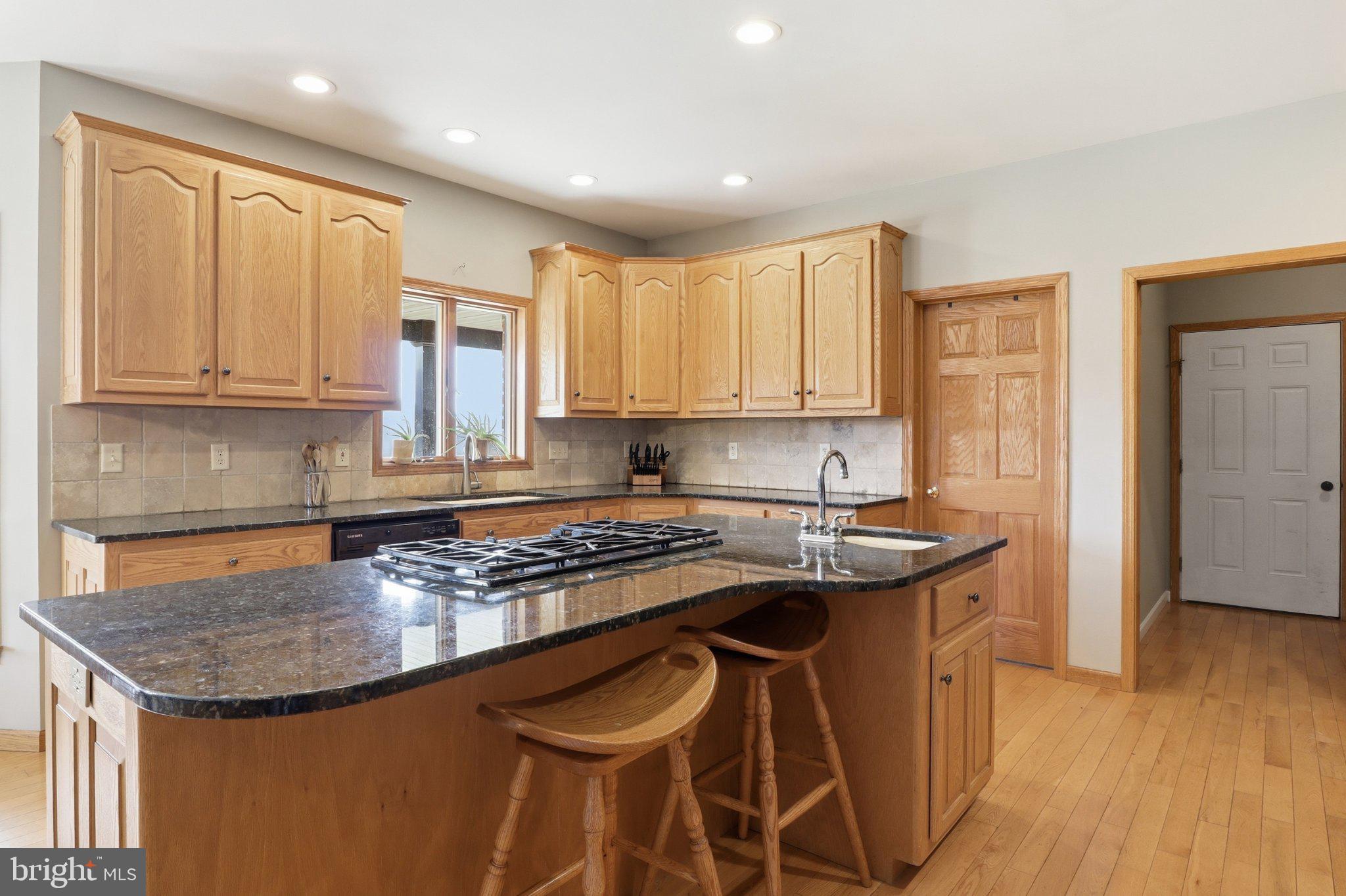 57 Mahanoy Valley Road Duncannon, PA 17020 - Photo 14 of 70 Inviting kitchen with warm wood tones.