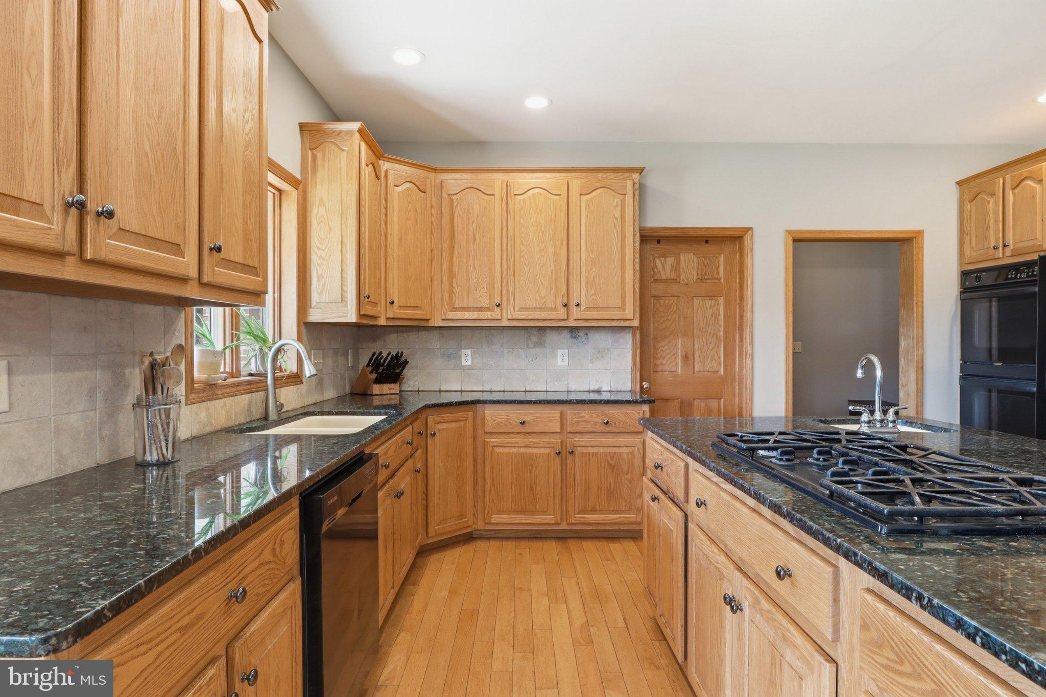 57 Mahanoy Valley Road Duncannon, PA 17020 - Photo 16 of 70 Warm wood tones in a spacious kitchen.