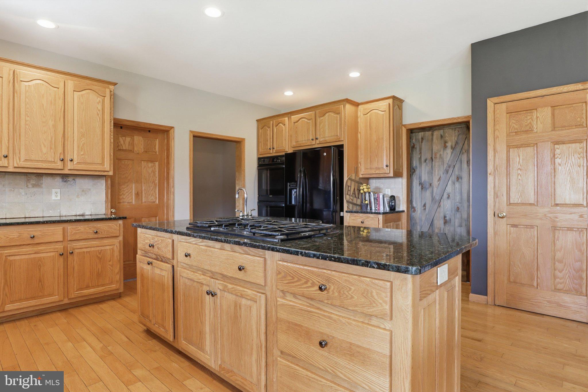 57 Mahanoy Valley Road Duncannon, PA 17020 - Photo 18 of 70 Warm oak kitchen with modern flair.