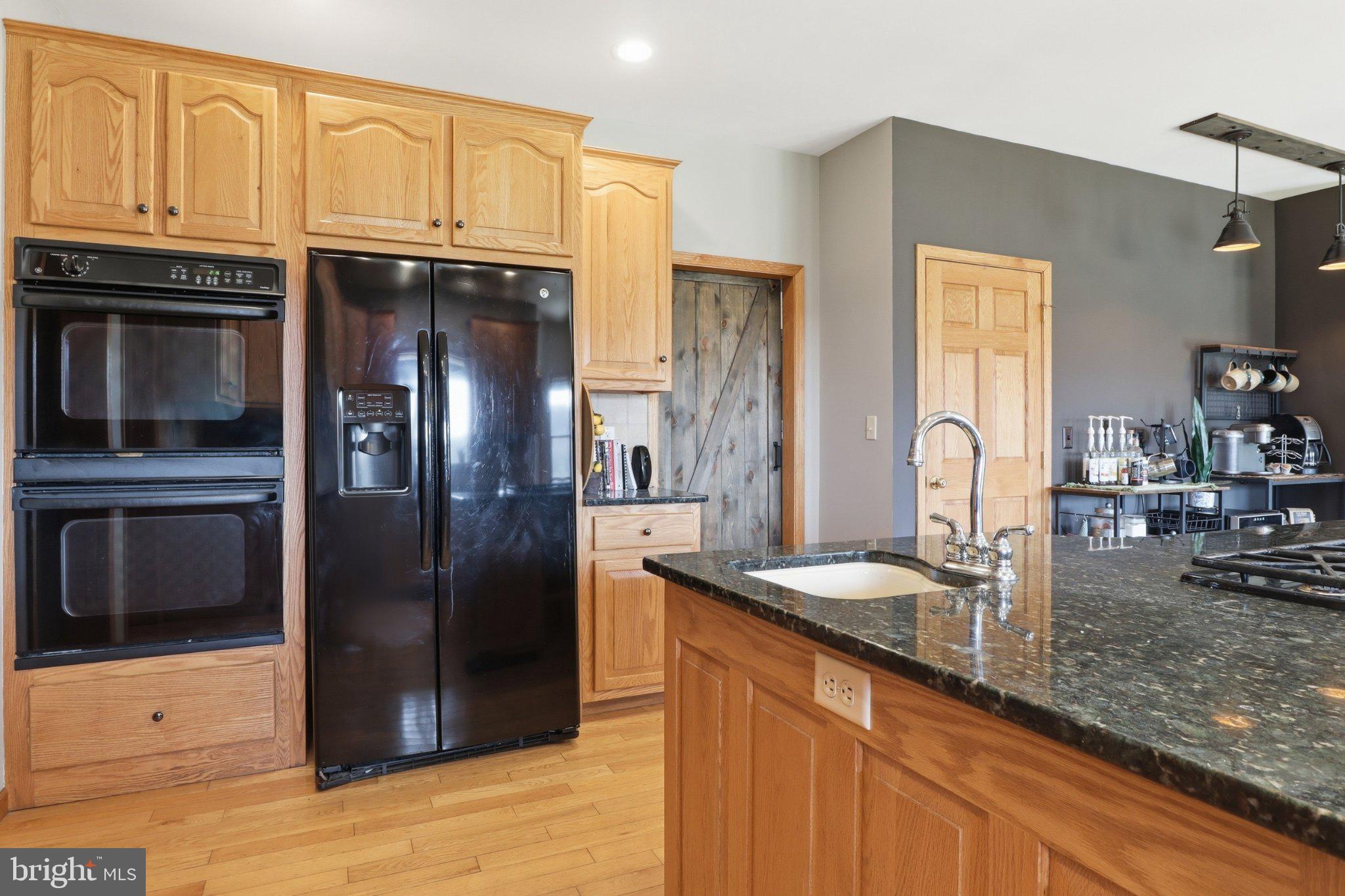 57 Mahanoy Valley Road Duncannon, PA 17020 - Photo 19 of 70 Modern kitchen with warm wood tones.