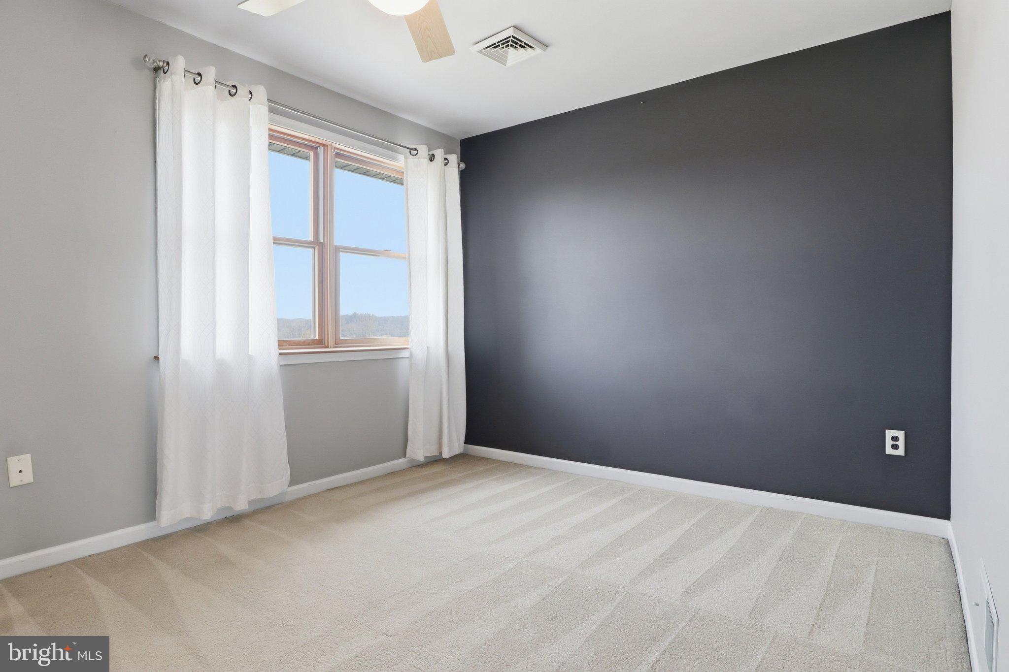 57 Mahanoy Valley Road Duncannon, PA 17020 - Photo 39 of 70 Bright and airy room with modern flair.