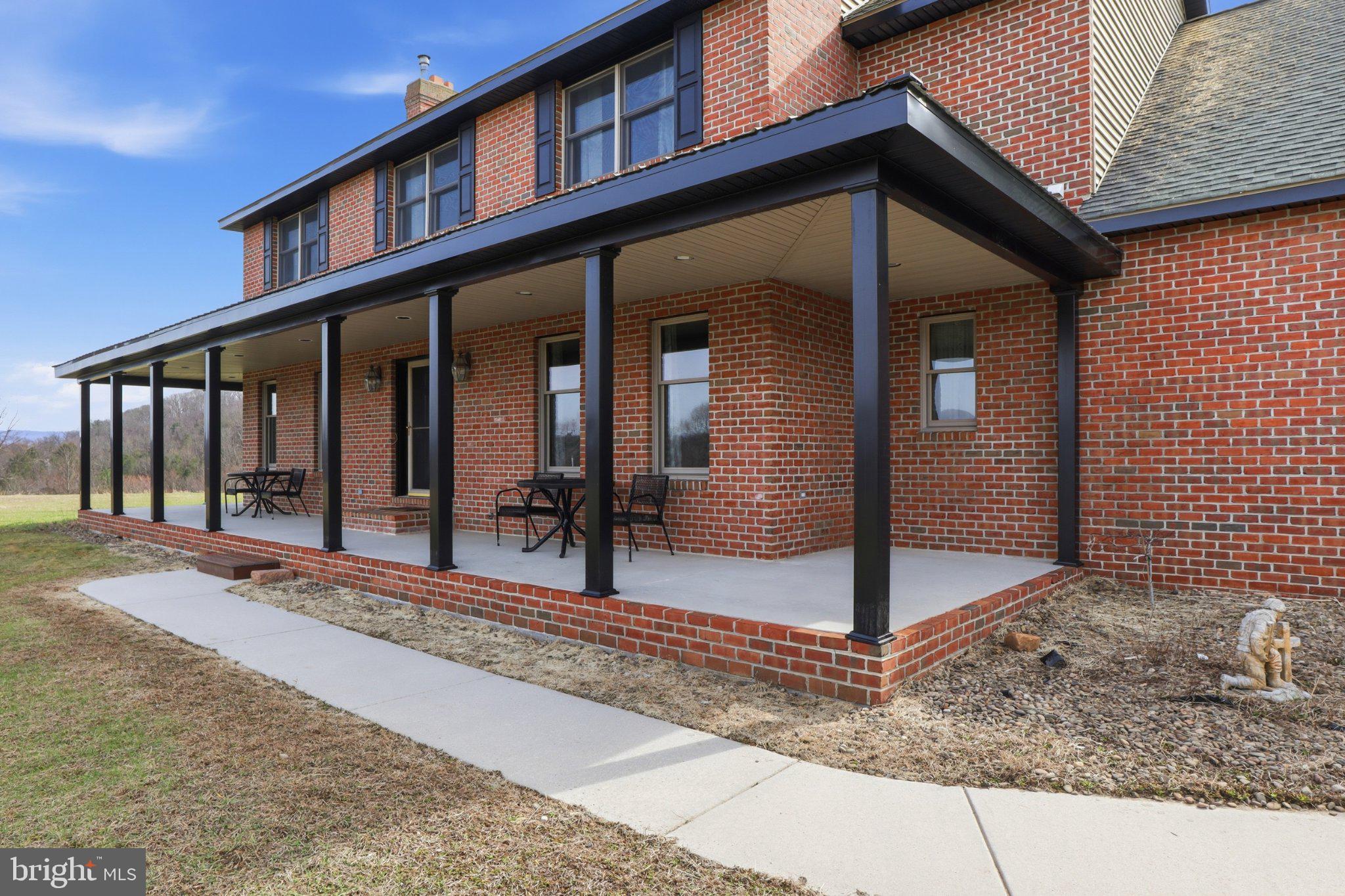 57 Mahanoy Valley Road Duncannon, PA 17020 - Photo 4 of 70 Charming brick home with inviting porch.
