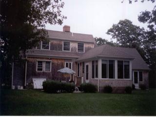 Undisclosed Address Barnstable, MA 02630 - Photo 2 of 6 a view of house with garden