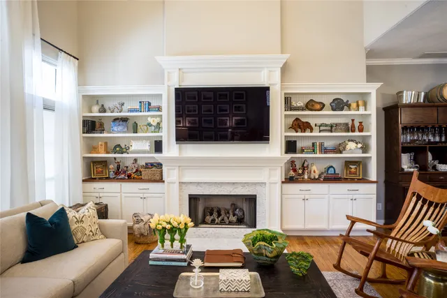 a view of a balcony with furniture and city view