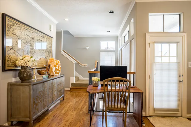 a bathroom with a granite countertop sink mirror and cabinets