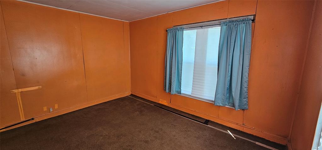 501 South Main Street Eden, TX 76837 - Photo 13 of 20 an empty room with window