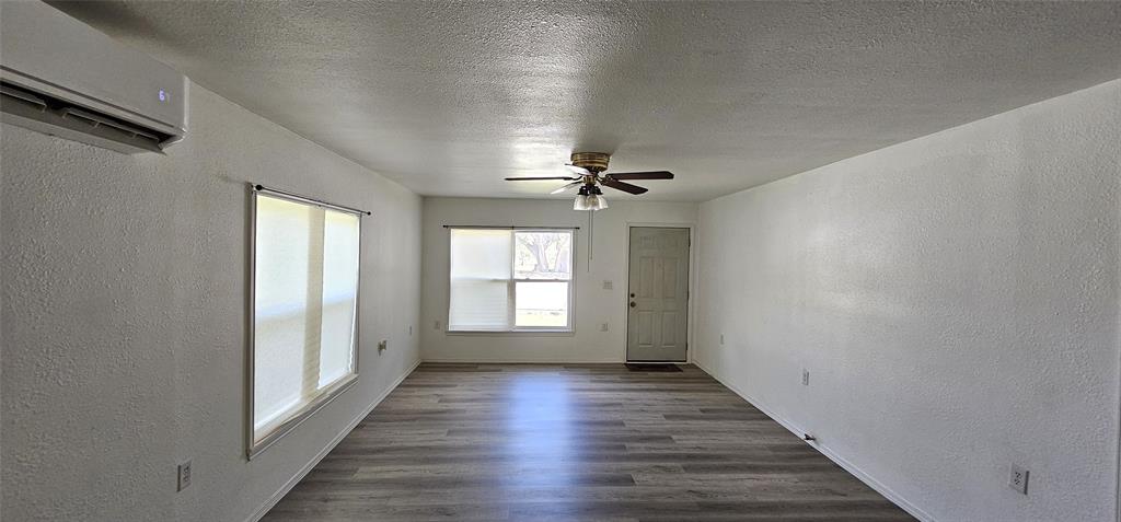 501 South Main Street Eden, TX 76837 - Photo 4 of 20 a view of gallery with wooden floor
