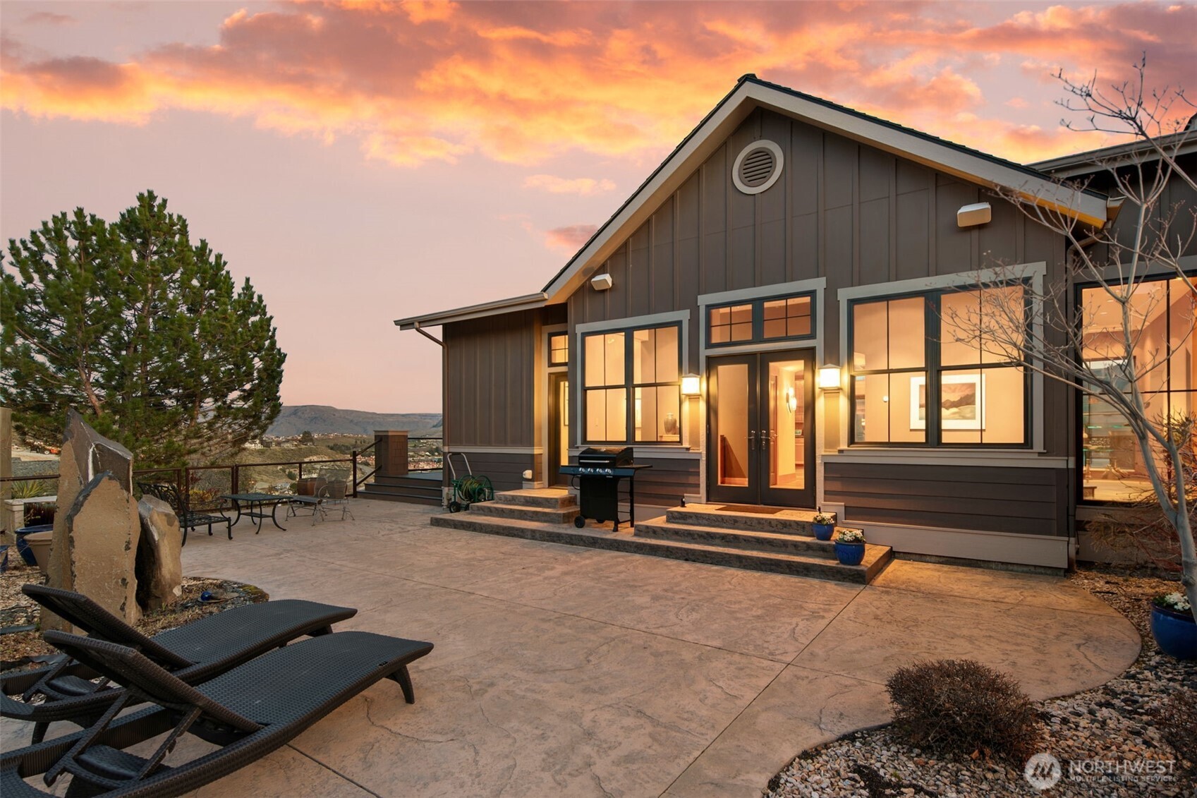 232 Crystal Drive Chelan, WA 98816 - Photo 2 of 39 a front view of a house with a yard