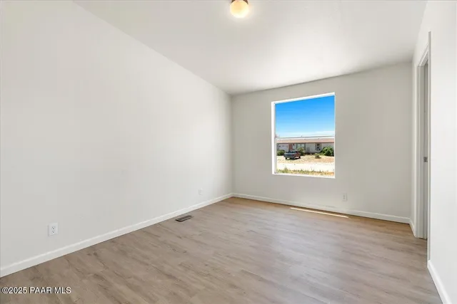 a bathroom with a sink toilet vanity and shower