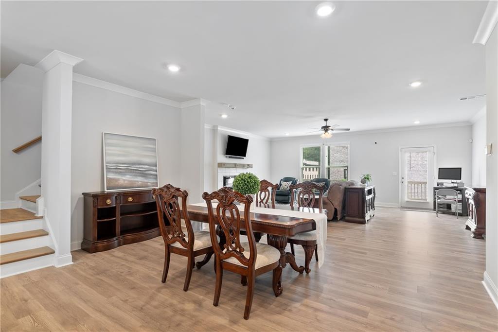 3334 Swallowtail Terrace Duluth, GA 30096 - Photo 19 of 30 a view of a dining room with furniture