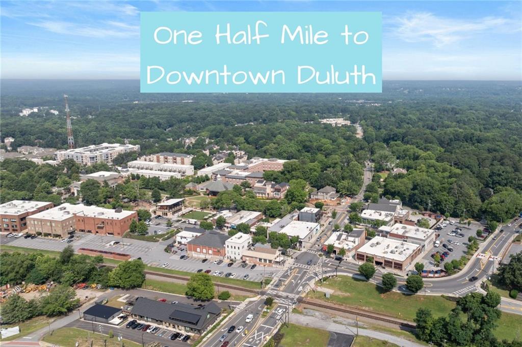 3334 Swallowtail Terrace Duluth, GA 30096 - Photo 24 of 27 a sign that is sitting in front of a building