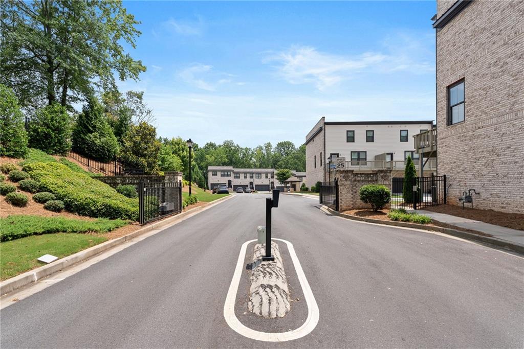 3334 Swallowtail Terrace Duluth, GA 30096 - Photo 25 of 27 a view of a street with cars