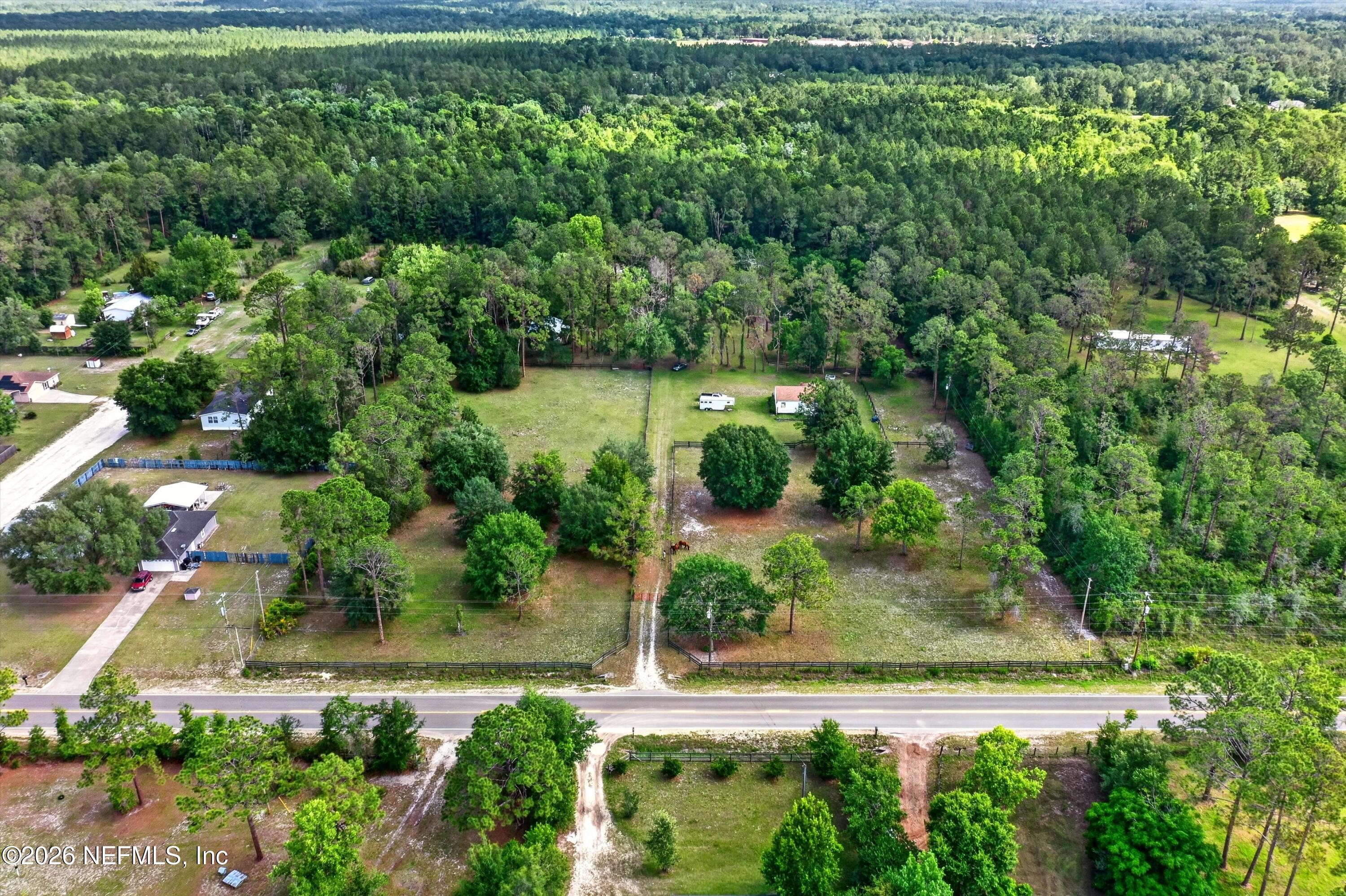 5214 Carter Spencer Road Middleburg, FL 32068 - Photo 42 of 50 an aerial view of a house with a yard
