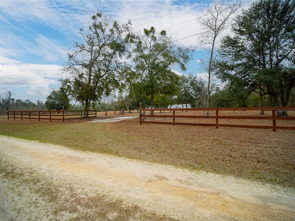 5431 163rd Path Live Oak, FL 32060 - Photo 13 of 49 a view of outdoor space with yard