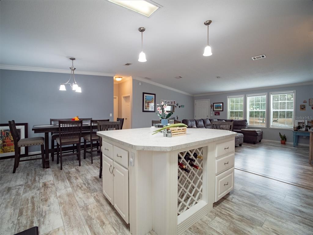5431 163rd Path Live Oak, FL 32060 - Photo 20 of 49 a large kitchen with a table and chairs