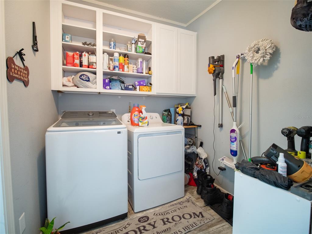 5431 163rd Path Live Oak, FL 32060 - Photo 25 of 49 a room with storage and utility
