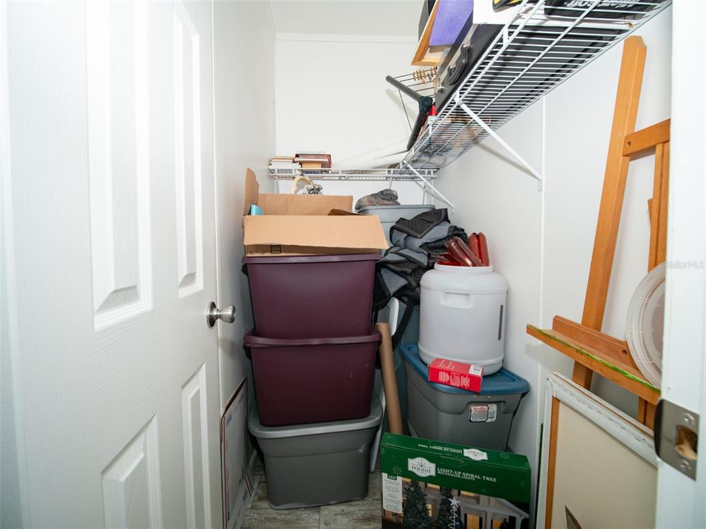 5431 163rd Path Live Oak, FL 32060 - Photo 43 of 49 a utility room with dryer washer and shoe rack