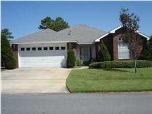 15 Bay Tree Drive Miramar Beach, FL 32550 - Photo 2 of 2 front view of a house with a yard