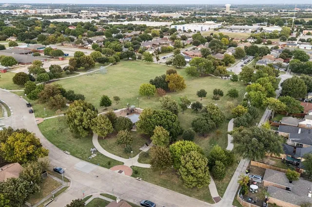 a view of a lake in middle of the town