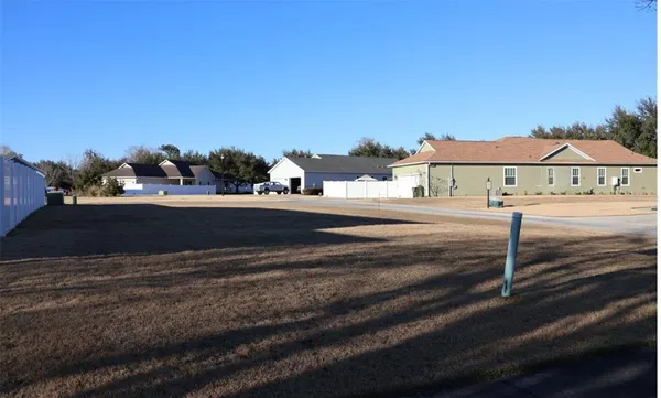 a view of a town with barn house
