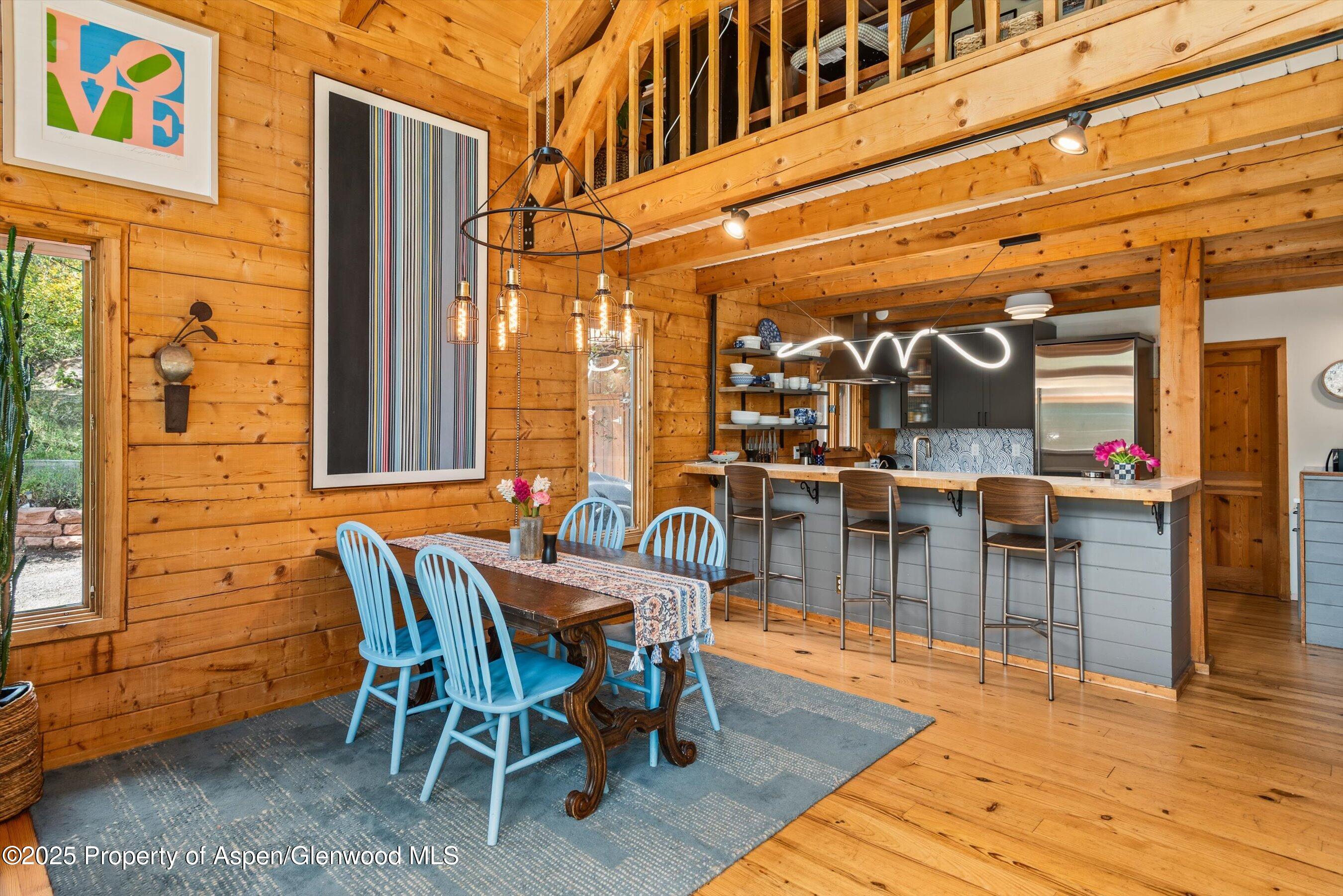 166 Ute Trail Carbondale, CO 81623 - Photo 18 of 38 a view of a patio with dining table and chairs
