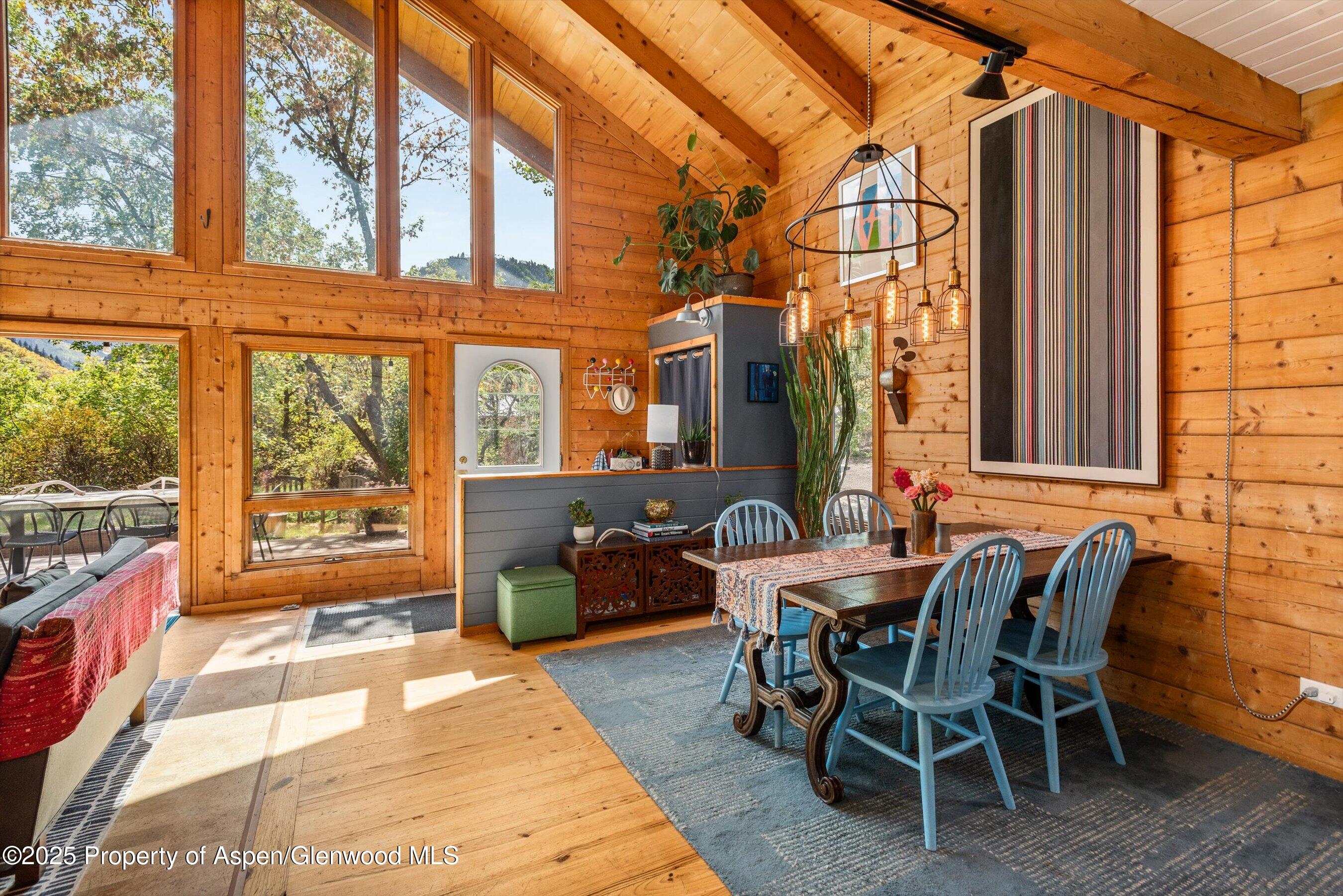 166 Ute Trail Carbondale, CO 81623 - Photo 21 of 38 a view of a patio with a table and chairs