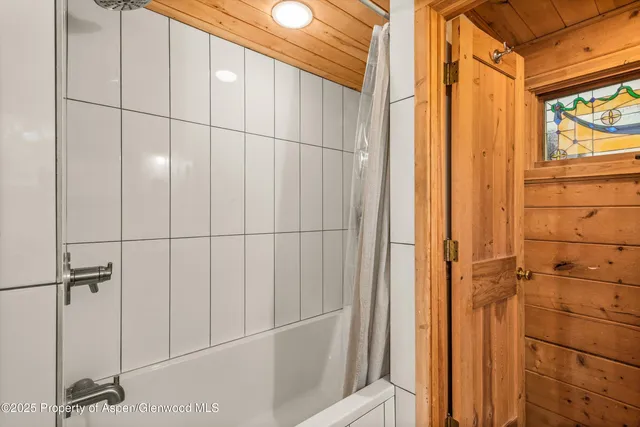 a view of balcony with wooden floor