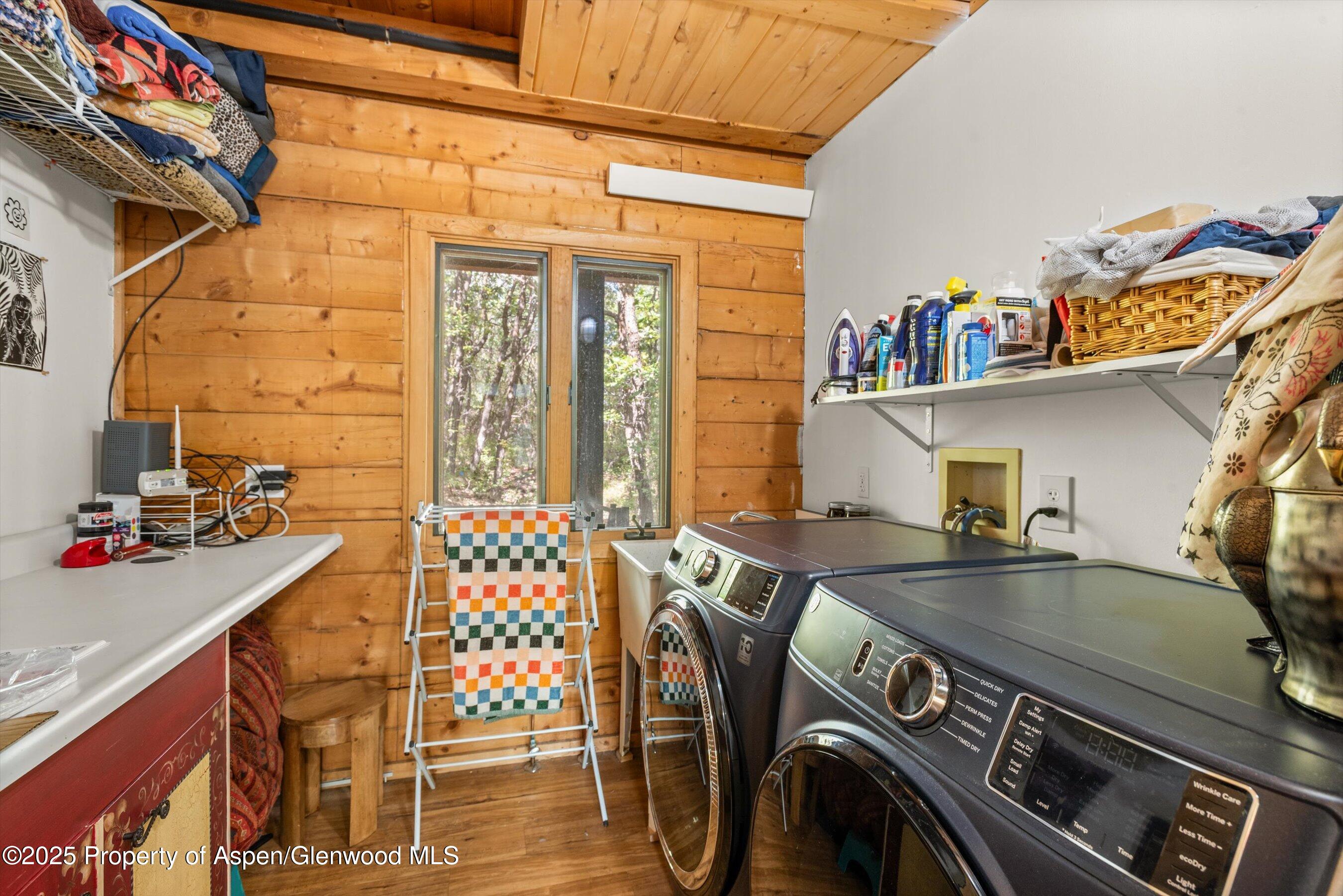 166 Ute Trail Carbondale, CO 81623 - Photo 36 of 38 a kitchen view with a stove and a table chair