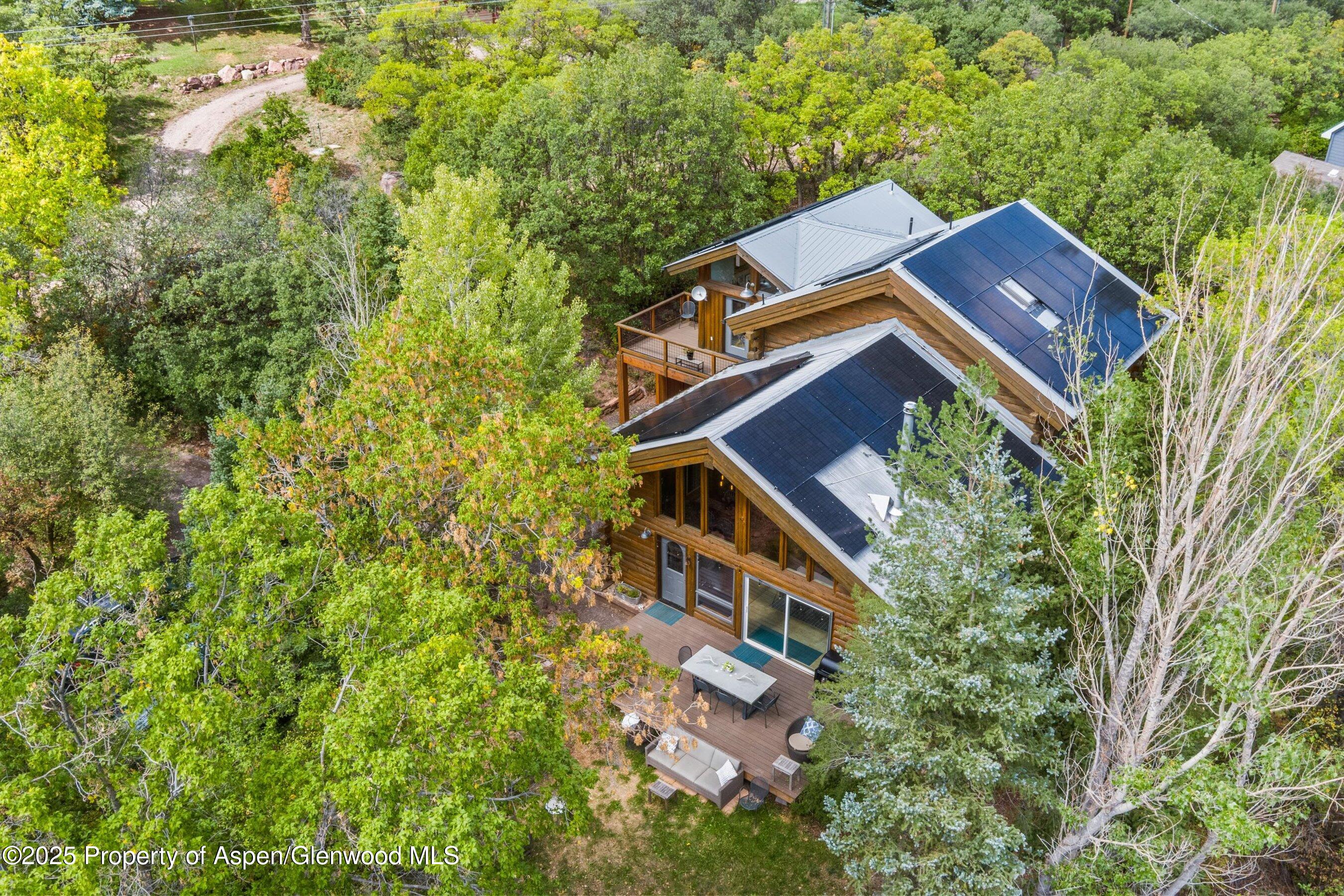 166 Ute Trail Carbondale, CO 81623 - Photo 38 of 38 an aerial view of a house with a yard
