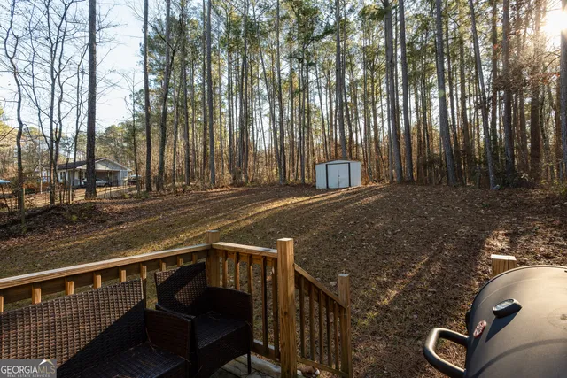 a view of a balcony with chairs