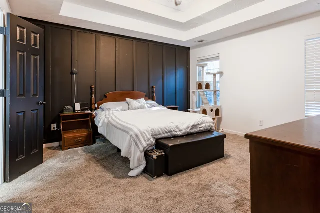 a room with a bed and a table