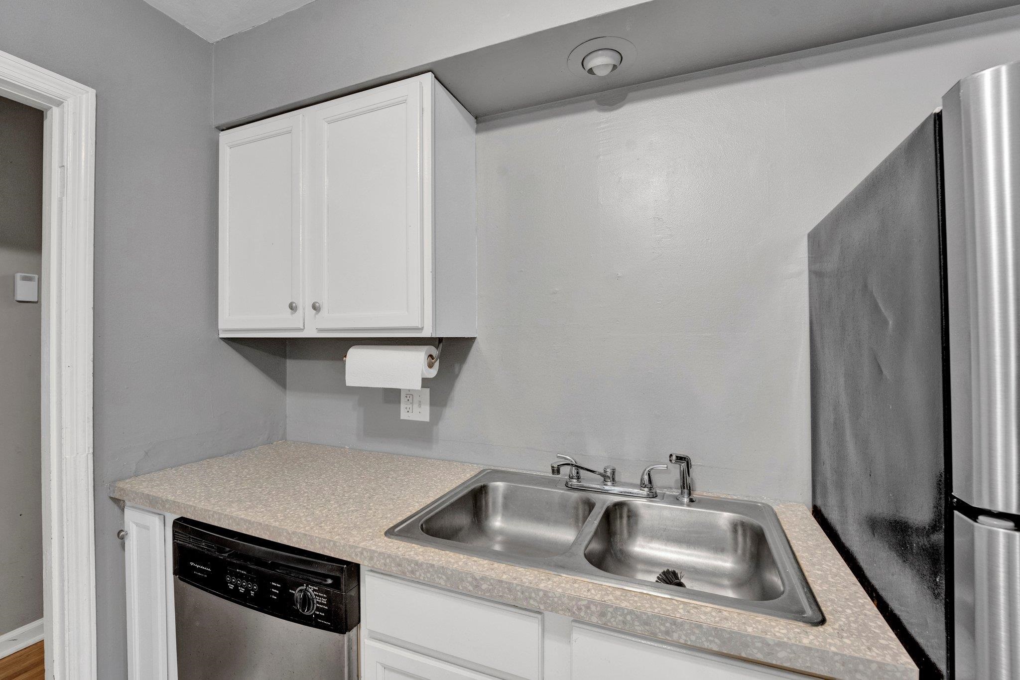 985 Wellsville Road Memphis, TN 38117 - Photo 17 of 24 a kitchen with a sink and cabinets