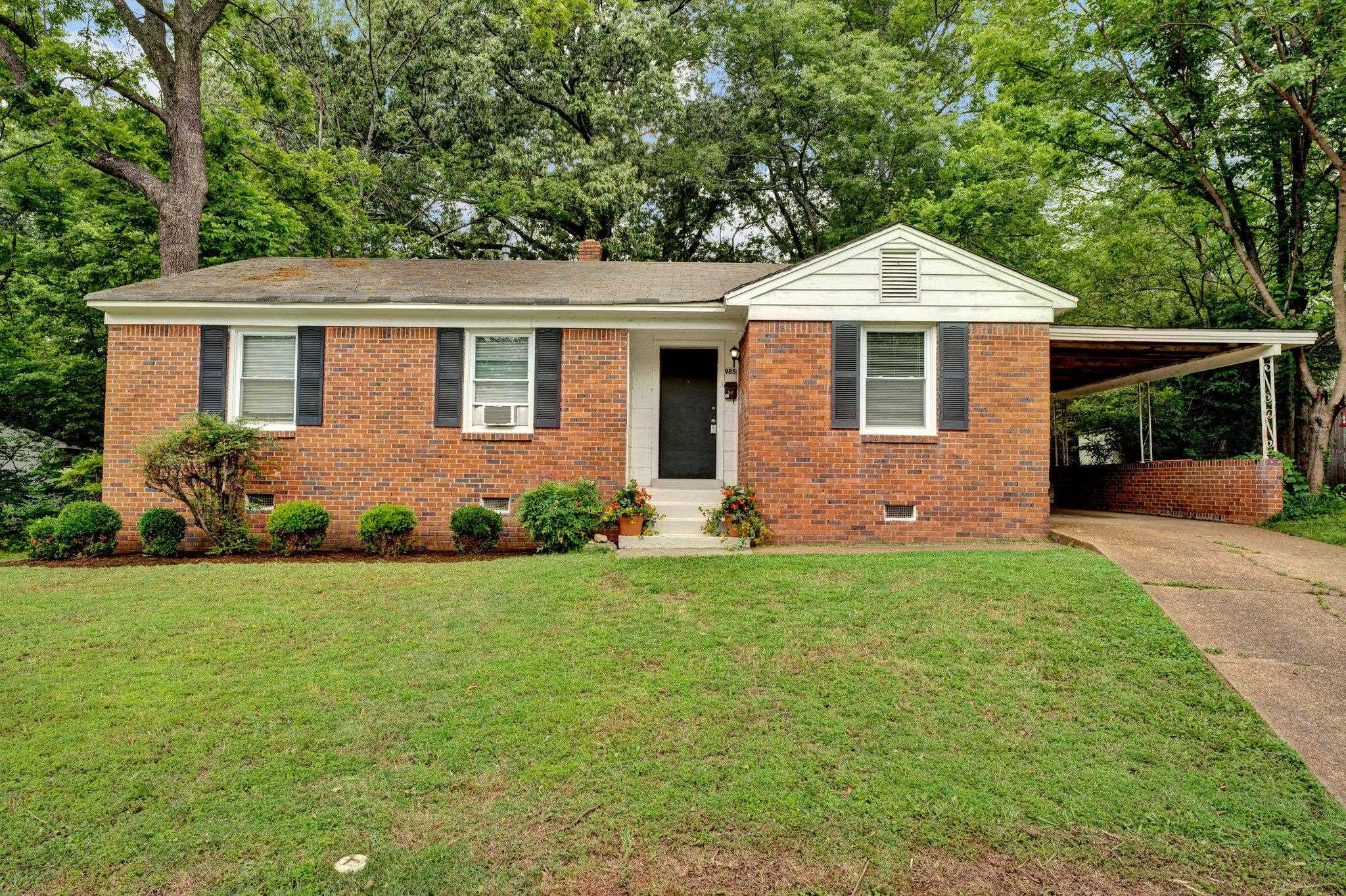 985 Wellsville Road Memphis, TN 38117 - Photo 2 of 24 a front view of a house with a yard