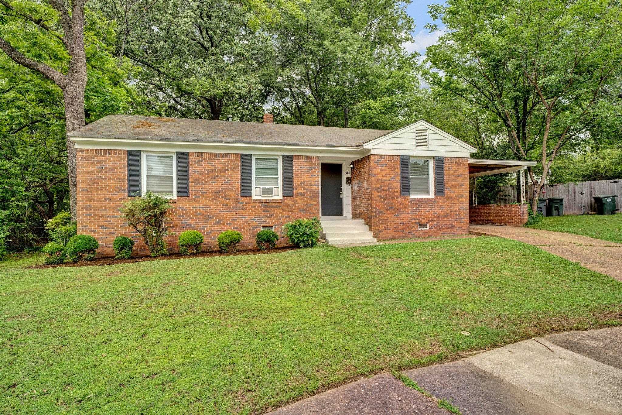 985 Wellsville Road Memphis, TN 38117 - Photo 5 of 24 a front view of a house with a garden